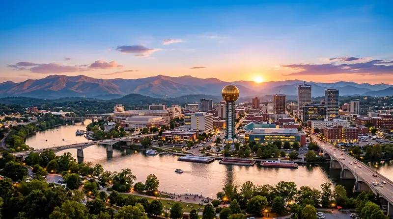 Knoxville, Tennessee skyline at sunset with the Sunsphere, bridges, and the Tennessee River